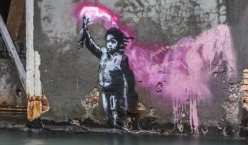 The Migrant Child” by Banksy detached from canal wall of Palazzo